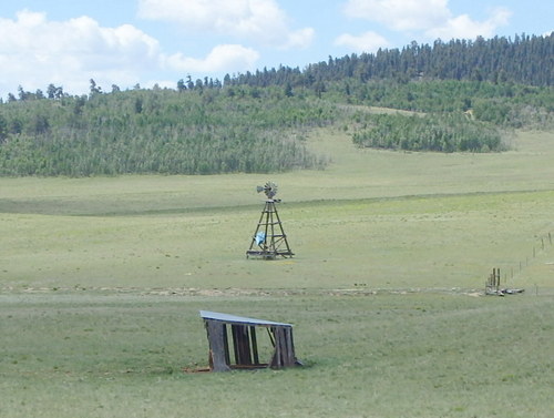 GDMBR: There must be an interesting story here, there is a canoe stowed inside the windmill.